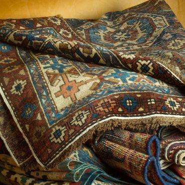 Perzisch tapijt met de kleuren blauw en bruin