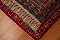 Perzisch tapijt met rood en blauw